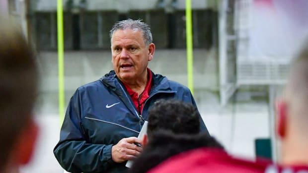 Arkansas coach Sam Pittman addresses the team during spring practices.